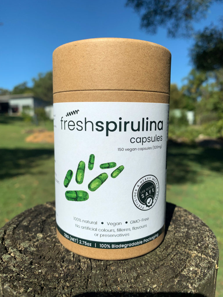 Spirulina capsules cylinder front image